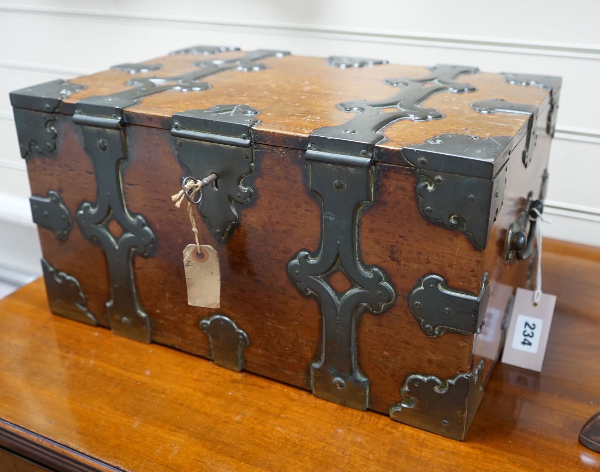 A mid 19th century brass bound stained pine North German Armada chest, with strapwork banding and brass loop handles, width 46cm depth 30cm height 23cm